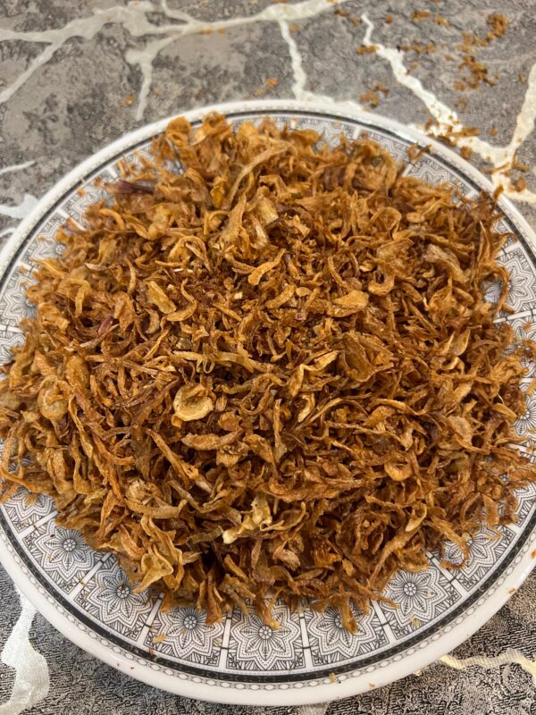 A bowl of crispy fried red onions (laal pyaz) – perfect for biryani and traditional cooking by Pyazon