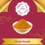 Chaat masala spice blend in a bowl with fruits and snacks – Pyazon spices