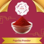 Paprika powder in a bowl with wooden spoon and scattered red pepper flakes – Pyazon spice collection