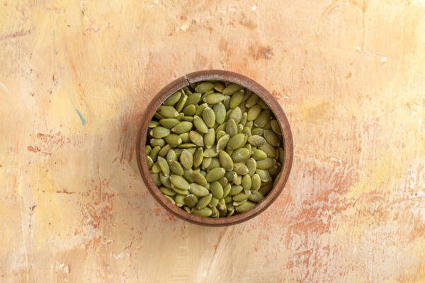 Bowl of fresh premium pumpkin seeds by Pyazon – healthy superfood for snacks and recipes